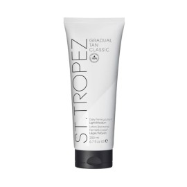 St.Tropez Gradual Tan Firming Lotion, Light to Medium Sun Kissed Glow Self Tan Moisturizer, with Hyaluronic acid and antioxidants, Streak-Free, Vegan, Natural & Cruelty-Free, 6.7 FL OZ
