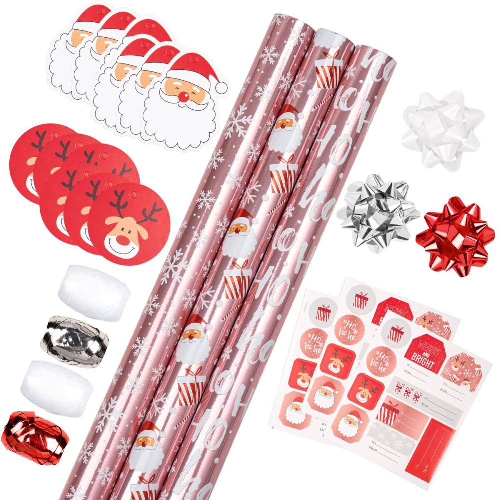 LeZakaa Christmas Wrapping Paper Bundle - Mini Roll with Bow, Ribbon, Sticker and Gift Tag - Pink Metallic Foil Design with Snowflakes/Santa Claus/HO Print -17 x 120 inches -3 Rolls(42.5 sq.ft.ttl.)