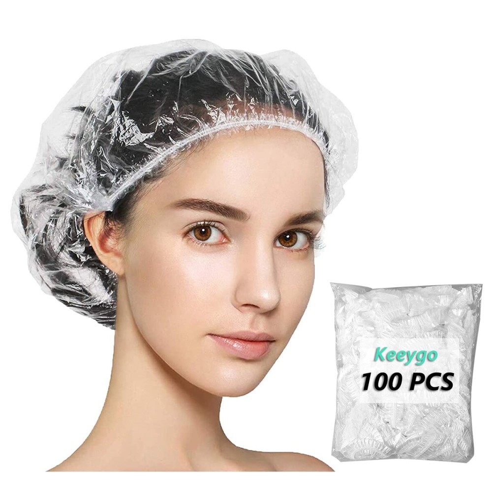 Keeygo Disposable Shower Caps 100 PCS Bath Caps Clear Waterproof Plastic Wraps for Women, Hotel Travel Essentials Accessories Hair Caps(20.5)