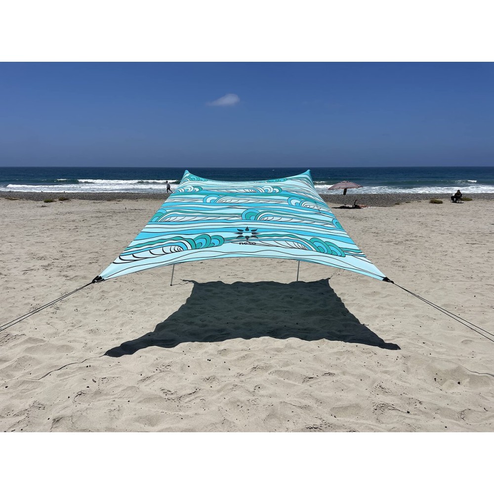Neso Portable Beach Tent Sun Shelter with Sand Anchor - Lightweight Beach Shade Canopy - Easy Setup for Family Outings - Patented Reinforced Corners - UPF 50+ Sun Protection - 7 x 7ft - Swells