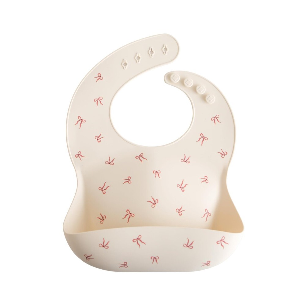 mushie Silicone Baby Bib | Adjustable Fit Waterproof Bibs (Bows)